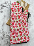 Oven mitts. Food. Strawberry