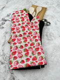 Oven mitts. Food. Strawberry