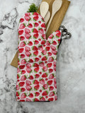 Oven mitts. Food. Strawberry