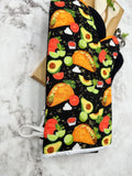 Oven mitts. Food. Tacos and Avocados
