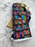 Oven Mitts. Books. Neon Bookshelf.