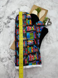 Oven Mitts. Books. Neon Bookshelf.