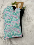 Oven mitts. Animals. Dragonflies on green.