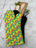 Oven mitts. Food. Citrus Fruit