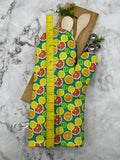 Oven mitts. Food. Citrus Fruit