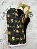 Oven Mitts. Bottles and books.
