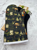 Oven Mitts. Bottles and books.
