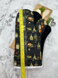 Oven Mitts. Bottles and books.