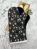 Oven Mitts. Skulls and poison.