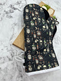 Oven Mitts. Skulls and poison.