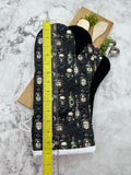 Oven Mitts. Skulls and poison.