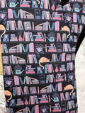 Oven Mitts. Books. Bookshelf Cat.