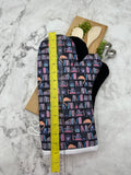 Oven Mitts. Books. Bookshelf Cat.
