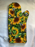 Oven mitts. Flowers. Sunflowers and blue birds.