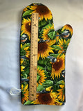 Oven mitts. Flowers. Sunflowers and blue birds.