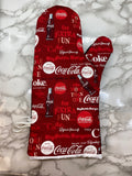 Oven mitts. Food. Soda. Pop. Coke
