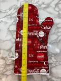 Oven mitts. Food. Soda. Pop. Coke