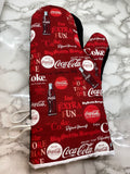 Oven mitts. Food. Soda. Pop. Coke