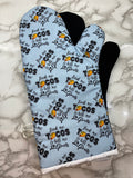 Oven mitts. Food. Tacos and call me pretty