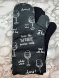 Oven mitts. Food. Wine glasses