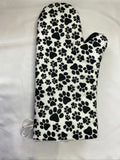 Oven mitts. Animals. Paw print on white