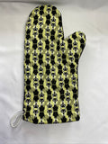 Oven mitts. Animals. Cat. Black on green