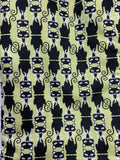 Oven mitts. Animals. Cat. Black on green