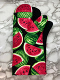 Oven mitts. Food. Watermelon