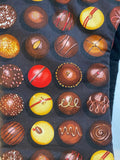 Oven mitts. Food. Chocolate truffles