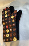 Oven mitts. Food. Chocolate truffles
