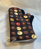 Oven mitts. Food. Chocolate truffles