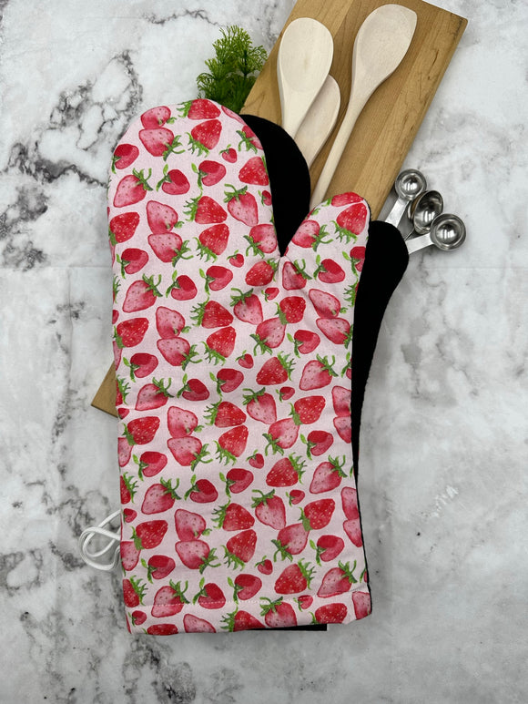 Oven mitts. Food. Strawberry
