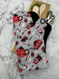 Oven Mitts. Food. Teapot and bags.