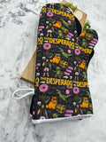 Oven Mitts. Pop Culture. Dungeon Crawler Carl. Desperado Club