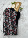 Oven Mitts. Winter. Snowflakes on black.
