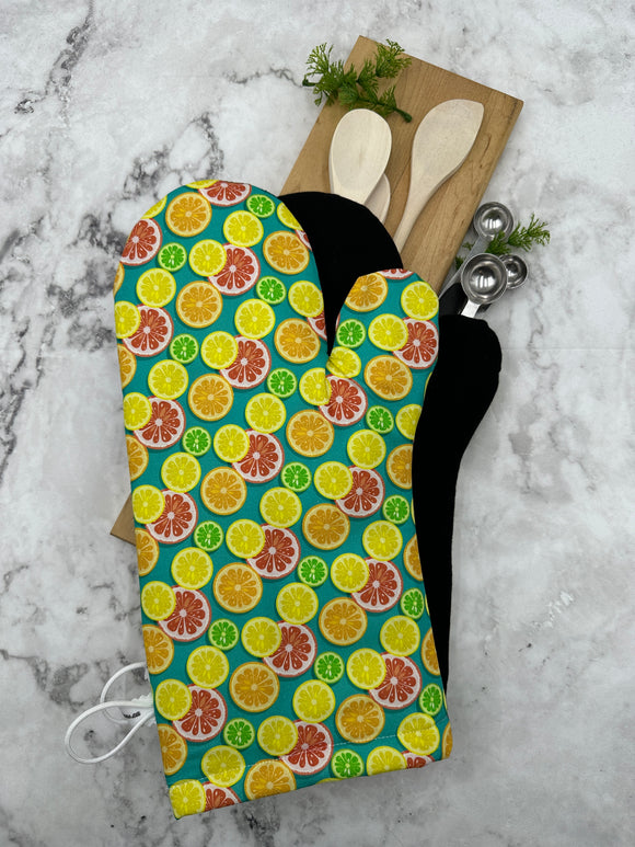 Oven mitts. Food. Citrus Fruit