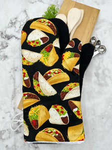 Oven mitts. Food. Tacos. Large print.