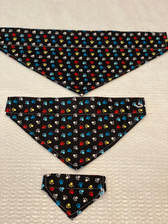 Paws Dog bandanas. Black with white/red/green/yellow paws . Small, medium, large, fits ON the collar!