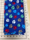 Paws Dog bandanas. Blue with white/red/green/yellow paws. Small, medium, large, fits ON the collar!