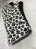 Oven mitts. Animals. Paw print on white.