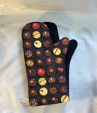 Oven mitts. Food. Chocolate truffles