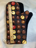 Oven mitts. Food. Chocolate truffles