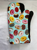 Oven mitts. Food. Donuts